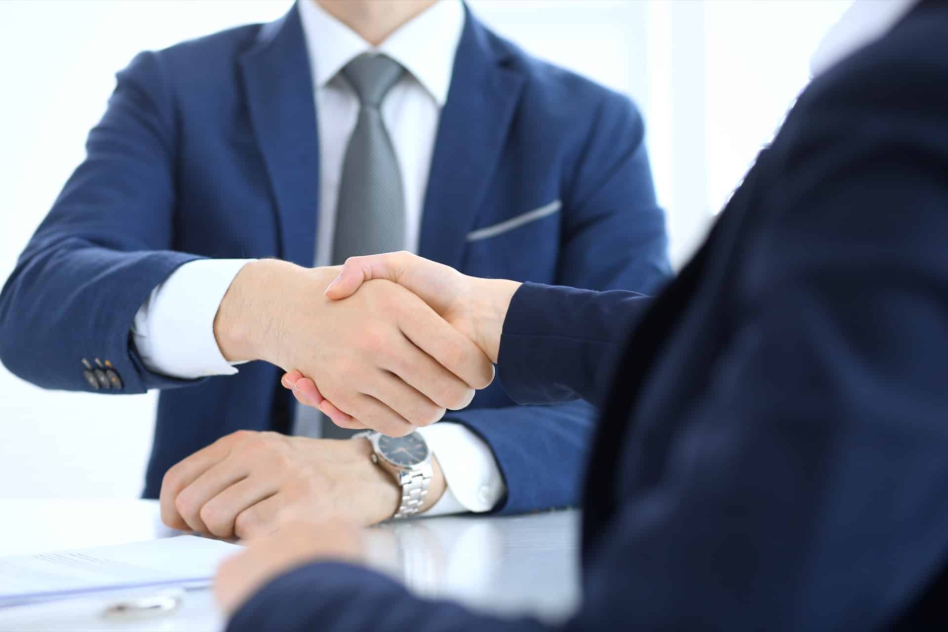 A man shaking hands with a Castle Rock car accident lawyer