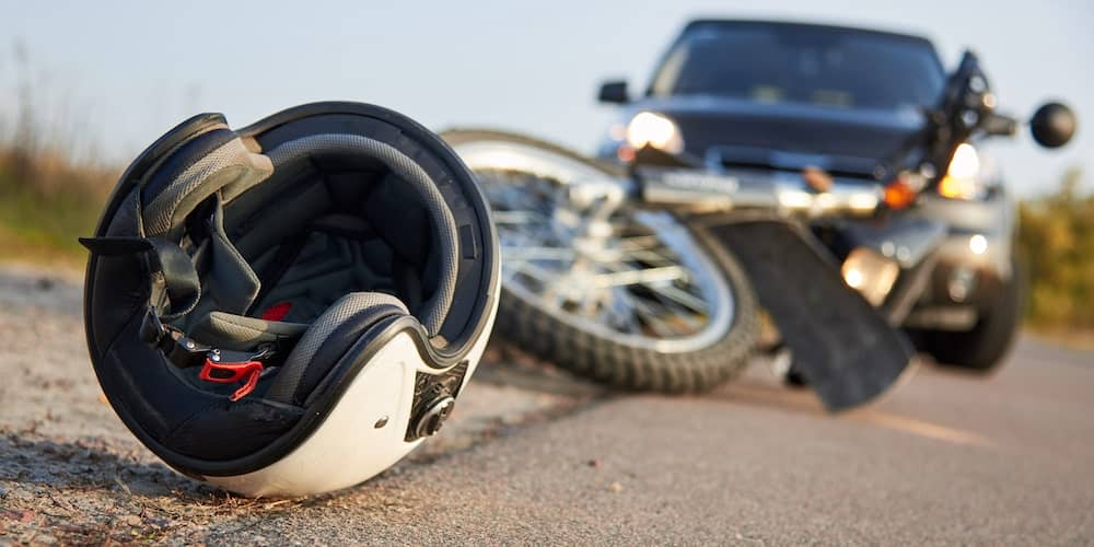 Motorcycle And helmet on the ground due to a Castle Rock motorcycle accident